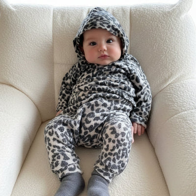 infant in leopard print hoodie and joggers