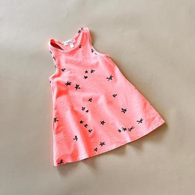 neon coral dress with star print